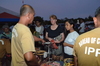 Guests buy souvenirs made by the IPPF inmates 2.JPG