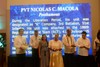 075. Daughter-in-law of PVT Nicolas Macola receives his award.jpg