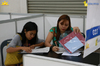 11. Applicants filling out their registration forms.