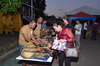 Guests buy souvenirs made by the IPPF inmates.JPG